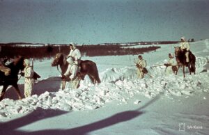 Häme Cavalry Regiment's men on horses and skies in Velikaja, Niva (SA-Kuva 15.3.1942). Velikaja Niva March 15th, 1942.