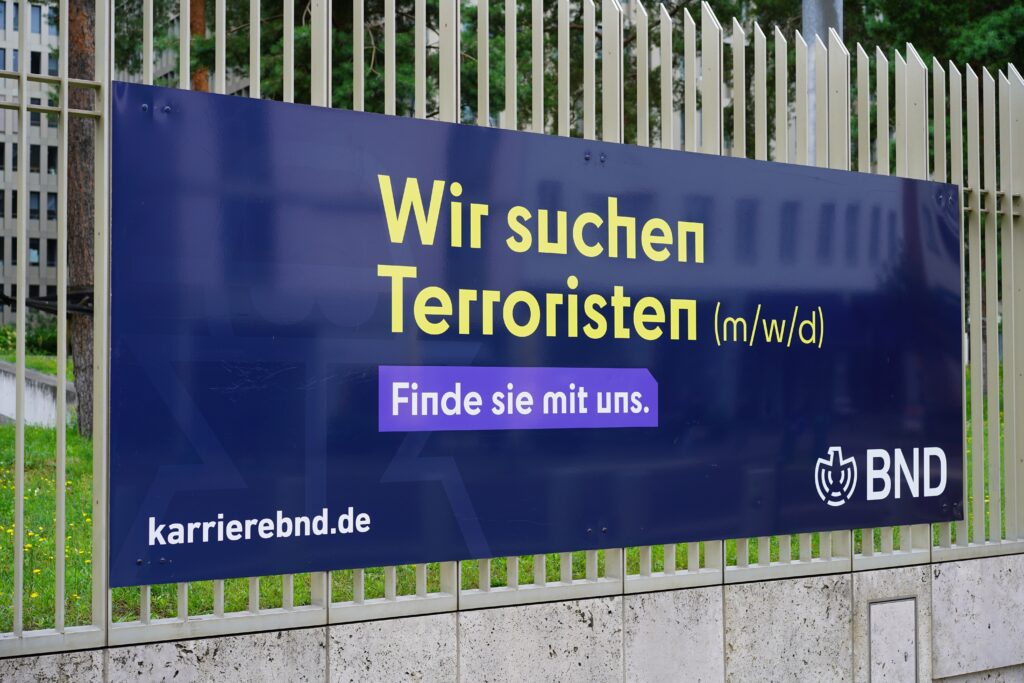 “We are looking for terrorists. Help us find them.” -BND bilboard