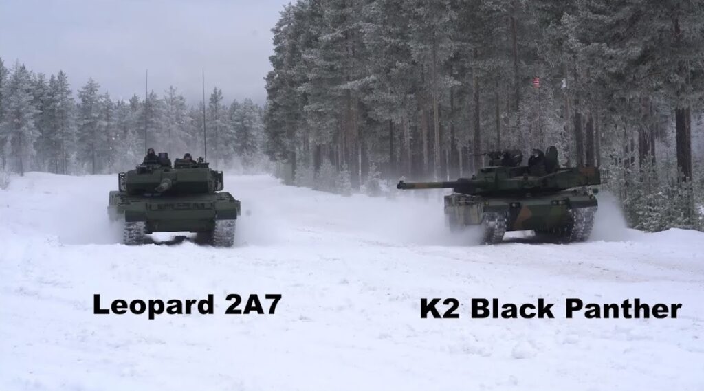 The two contenders in Norway’s tank tender. This image shows mobility trials, where the K2 came out on top. (Source: YouTube Screen capture, YouTube account “Big Forest,” www.BANDICAM.com) The two contenders in Norway’s tank tender. This image shows mobility trials, where the K2 came out on top. (Source: YouTube Screen capture, YouTube account “Big Forest,” www.BANDICAM.com)